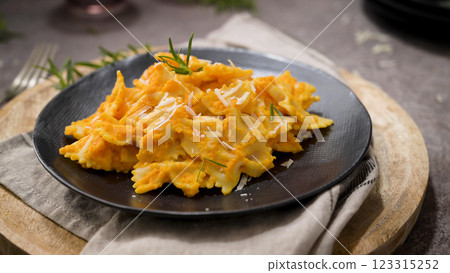 Farfalle pasta with pumpkin sauce Farfalle pasta with pumpkin sauce 123315252