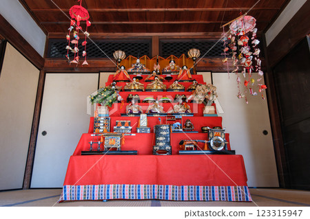 Seven-tiered Hina doll display and hanging dolls 123315947