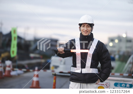 Men with work clothes to play guts Men with work clothes to play guts 123317264
