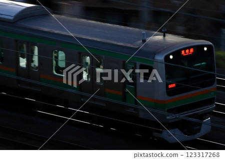 Takasaki Line E231 series train at dusk 123317268