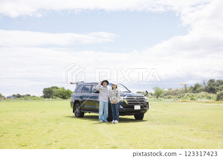 A couple going out by SUV couple A couple going out by SUV couple 123317423