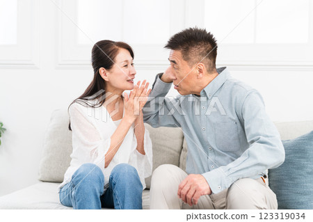 A wife who talks repeatedly to her deaf husband A wife who talks repeatedly to her deaf husband 123319034