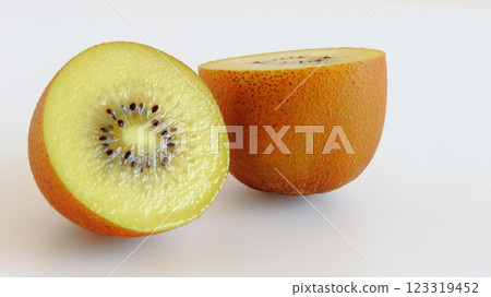 A half-cut, juicy gold kiwi fruit from New Zealand A half-cut, juicy gold kiwi fruit from New Zealand 123319452