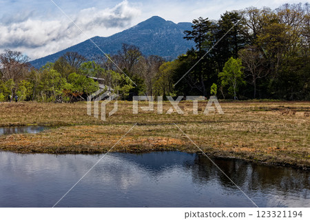 View of Ryugu hut and Mt. Hiuchigatake in early summer at Ozegahara View of Ryugu hut and Mt. Hiuchigatake in early summer at Ozegahara 123321194