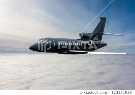 Black modern luxury executive aircraft flies in the air above the clouds 123321986
