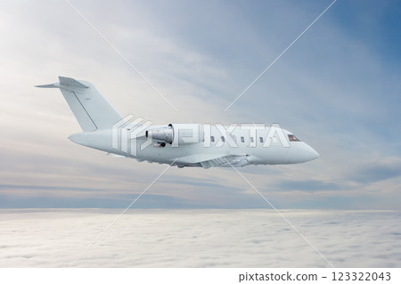 White luxury business jet flying in the air above the clouds 123322043
