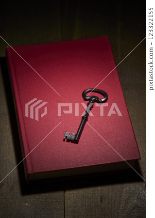Antique red book and key 123322155