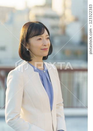 A confident middle-career woman A confident middle-career woman 123322383