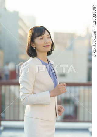 A confident middle-career woman A confident middle-career woman 123322384