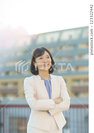 A confident middle-career woman A confident middle-career woman 123322442