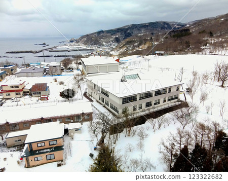 Aerial view of Meiwa Elementary School in Otobe, Hokkaido in winter 123322682