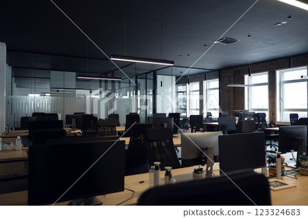 Modern business, glass-walled startup office, open and spacious workspace exudes a modern and innovative vibe, fostering a dynamic atmosphere that supports creativity, collaboration, and business 123324683