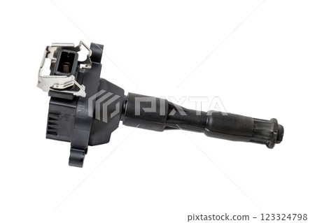 Black ignition coil for engine, isolated on white background. Spare parts for vehicle repair in garage 123324798