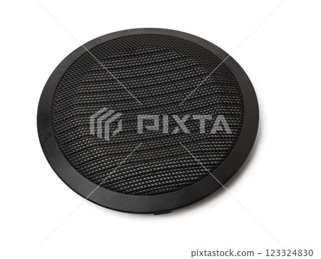 Stylish car audio acoustic round speaker with waffle grill protector cover on white background closeup. Auto spare parts catalog Stylish car audio acoustic round speaker with waffle grill protector cover on white background closeup. Auto spare parts catalog 123324830