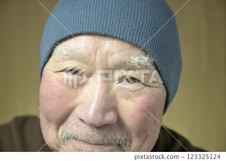 Smiling old man with a beard Smiling old man with a beard 123325124