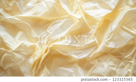 light beige wrinkled fabric texture background 123325565