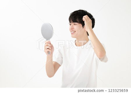 A man seeing a mirror A man seeing a mirror 123325659