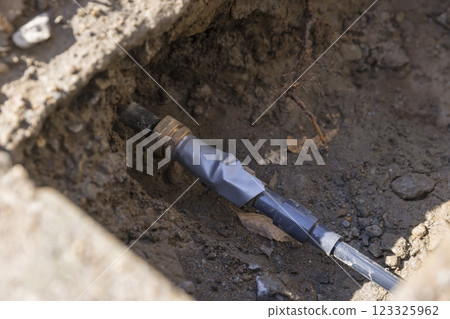 Image of new water pipe replacement Water leak repair work Image of new water pipe replacement Water leak repair work 123325962