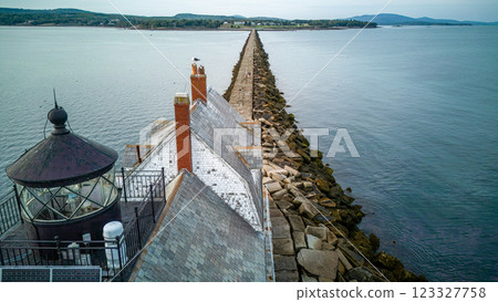 Rockland Breakwater Lighthouse cutting through the harbor on the Gulf of Maine Rockland Breakwater Lighthouse cutting through the harbor on the Gulf of Maine 123327758