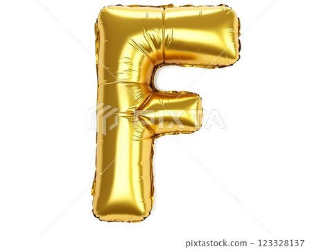 Large golden foil letter F used for decoration at a celebration or event in a bright setting 123328137