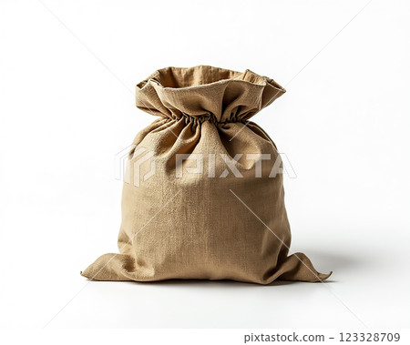 Natural fabric bag filled with goods displayed on a clean white background 123328709