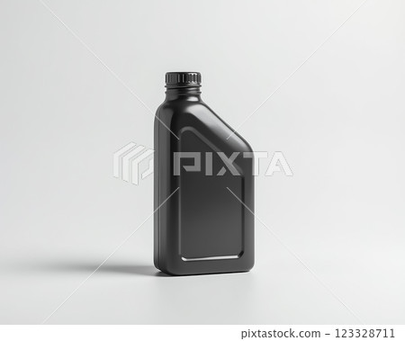 Black plastic bottle with a sleek design, ideal for storing liquids, placed on a light background 123328711