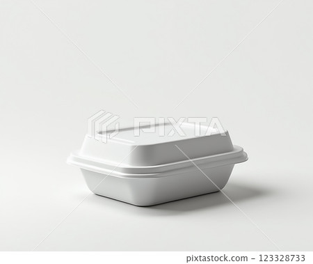 Simple white takeout container showcasing a modern design with clean lines and a compact shape ideal for food storage Simple white takeout container showcasing a modern design with clean lines and a compact shape ideal for food storage 123328733