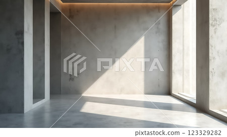 Modern interior space with minimalist design featuring natural light and smooth concrete surfaces 123329282