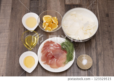 Marinated prosciutto and radish salad 123329515