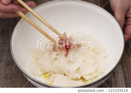 Marinated prosciutto and radish salad 123329528