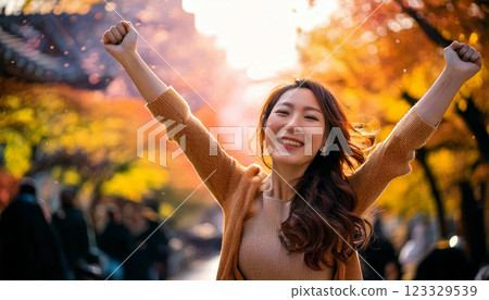 A woman pumping her fist in joy (AI-generated image) 123329539