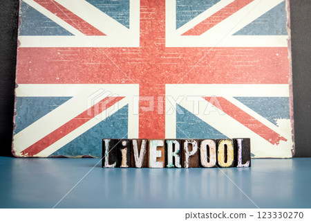 LIVERPOOL. Urban Area in Great Britain. Flag and alphabet letters on wooden texture background LIVERPOOL. Urban Area in Great Britain. Flag and alphabet letters on wooden texture background 123330270