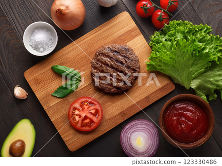 Hamburger steak on a cutting board Hamburger steak on a cutting board 123330486