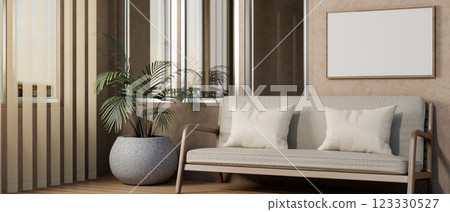 The grey sofa with pillows place beside a big pot plant and glass windows with see trough curtains. The grey sofa with pillows place beside a big pot plant and glass windows with see trough curtains. 123330527