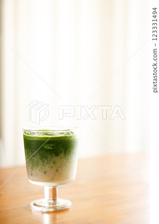 Iced matcha latte, authentic japanese matcha latte drink in a glass. 123331494