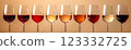 Glasses of different wines on the table 123332725