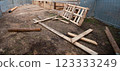 Wood house demolition or disaster with wooden boards 123333249