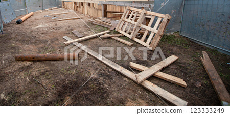 Wood house demolition or disaster with wooden boards 123333249