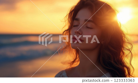Serene Young Woman Meditating on the Beach at Sunset for Wellness Retreats, Mental Health Awareness, and Relaxation Concepts 123333363