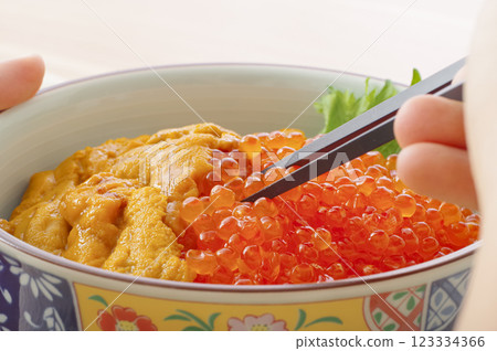 Delicious looking sea urchin and salmon roe bowl Delicious looking sea urchin and salmon roe bowl 123334366