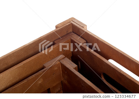 Fragment of a wooden box close-up on a white background Fragment of a wooden box close-up on a white background 123334677