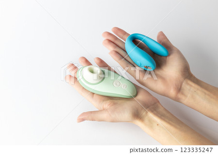 on white background on women's radon blue vibrator for double penetration and mint vacuum pleasure for two waterproof modern device variety for a couple partner replacement 123335247
