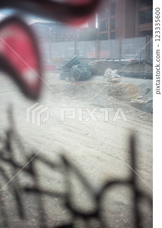 Construction site net with graffiti Construction site net with graffiti 123335600