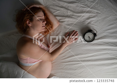 Pregnant woman suffers from insomnia.  123335748