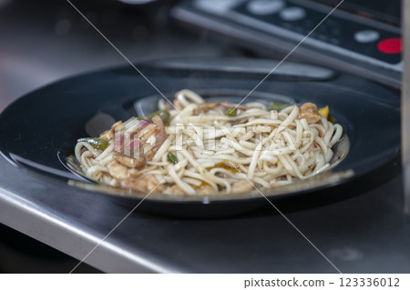 Mcoronas in a frying pan are prepared for Japanese cuisine. Mcoronas in a frying pan are prepared for Japanese cuisine. 123336012