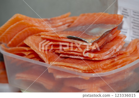 Sliced red fish pieces for making sushi. 123336015