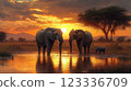 Elephants enjoying sunset by the water in a serene African landscape. Generative AI 123336709