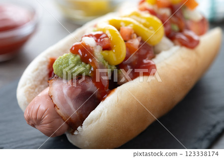 Sonoran hot dog. Traditional Mexican hot dog on wooden table 123338174
