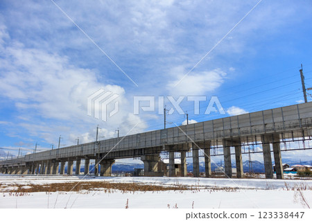 A clear winter day and the Hokuriku Shinkansen viaduct A clear winter day and the Hokuriku Shinkansen viaduct 123338447