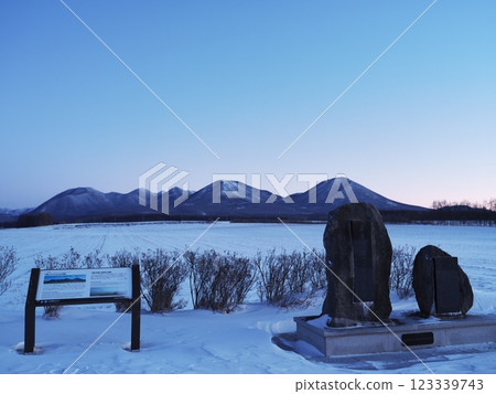 Hokkaido in the harsh winter: View of the Shikaribetsu volcano group from the volcano observation point in Shikaoi Town at dawn 123339743